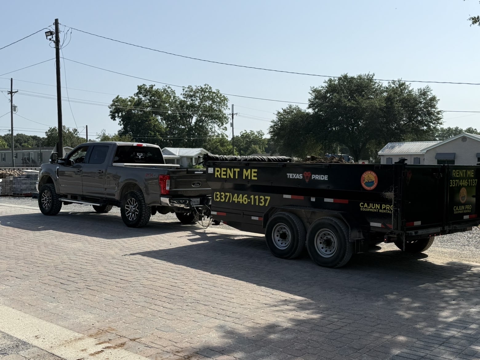 Rear view of the loaded Rent Me dump trailer